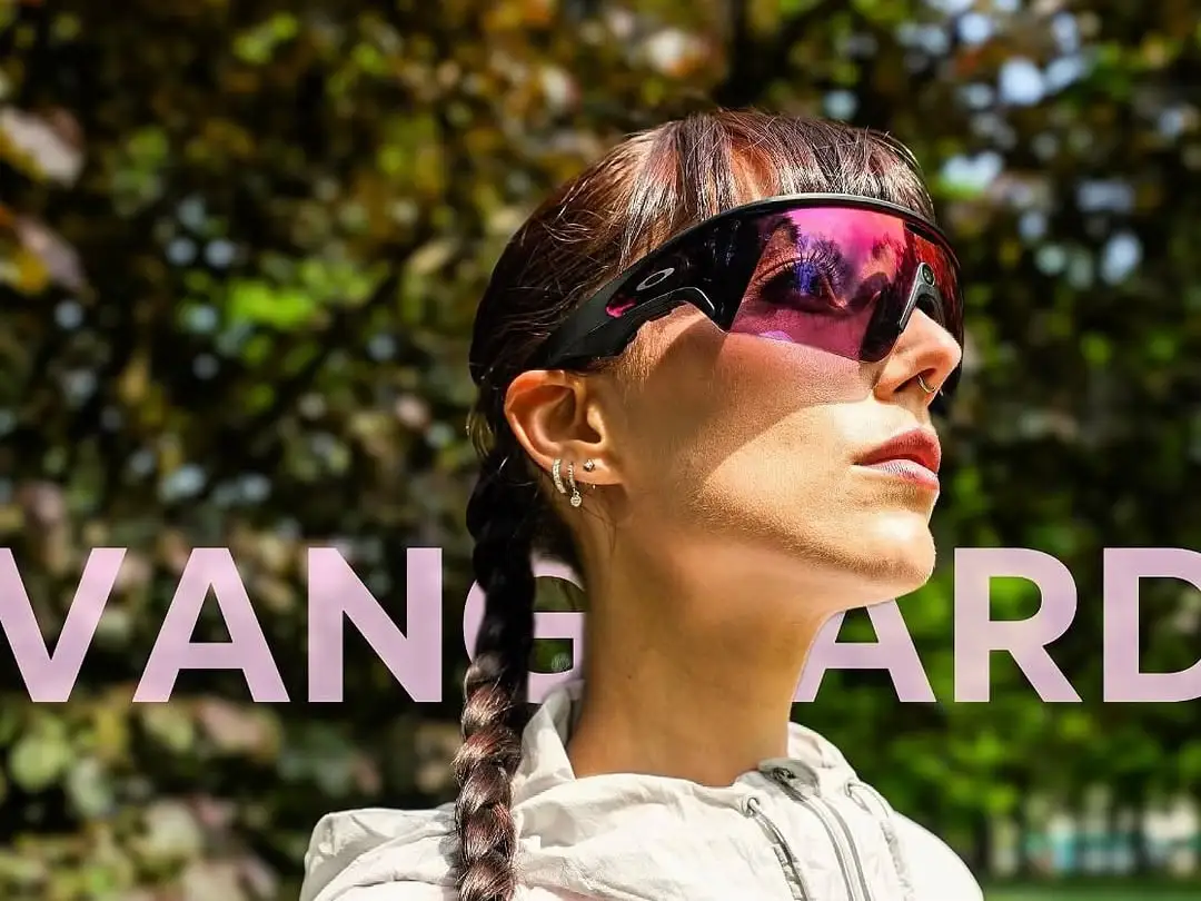 Creator wearing Oakley sunglasses with pink mirrored lenses, with the word VANGUARD overlaid